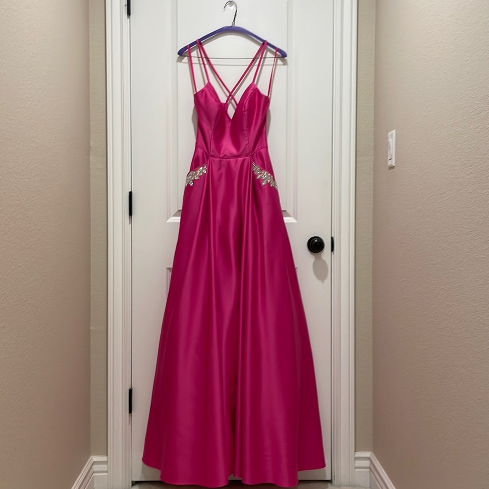 Spaghetti strap, v-neck satin ball gown.